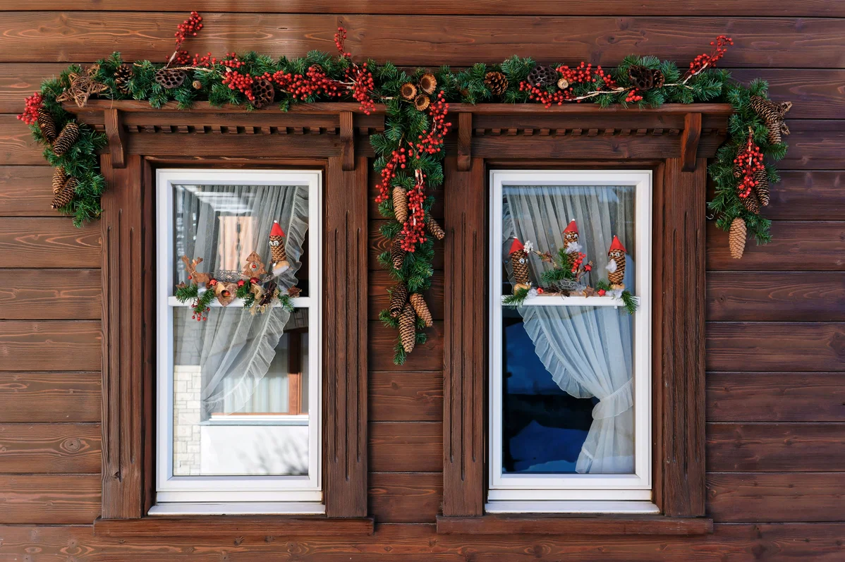 Historical view of candles in windows as a symbol of welcome Historical view of candles in windows as a symbol of welcome