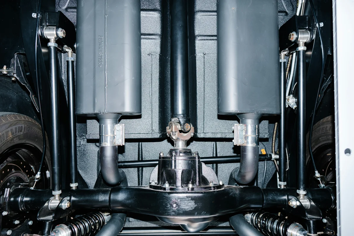 Exhaust system of a car cooling down after a drive Exhaust system of a car cooling down after a drive