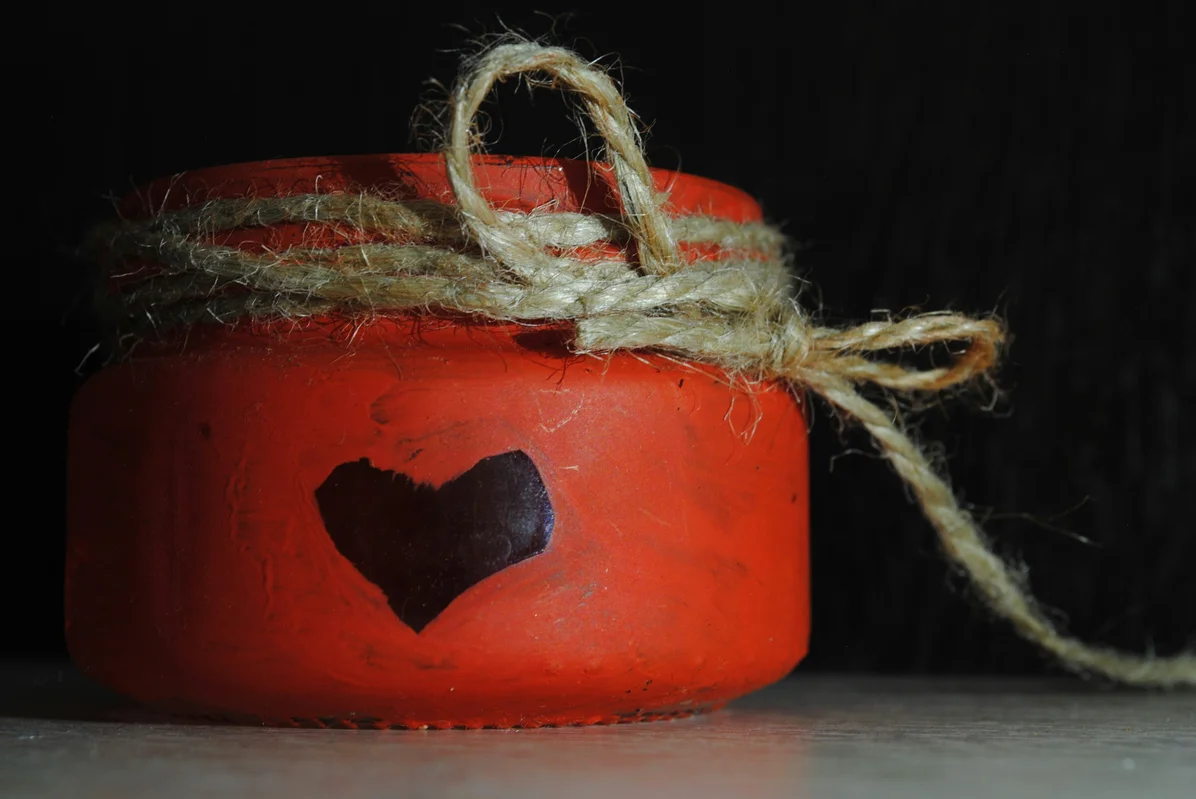 A variety of decorative jars wrapped in rope for home decor A variety of decorative jars wrapped in rope for home decor
