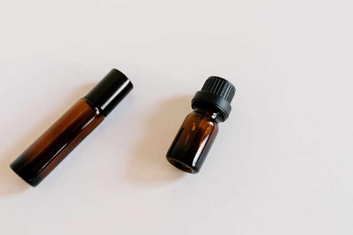 Bottles of cedar oil and witch hazel for DIY tick spray Bottles of cedar oil and witch hazel for DIY tick spray
