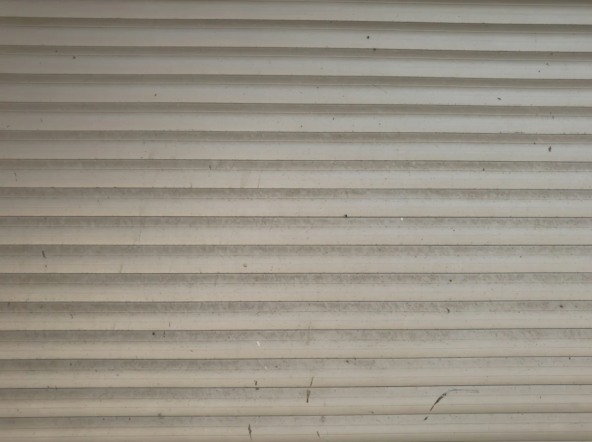 Person maintaining DIY paper window treatments Person maintaining DIY paper window treatments
