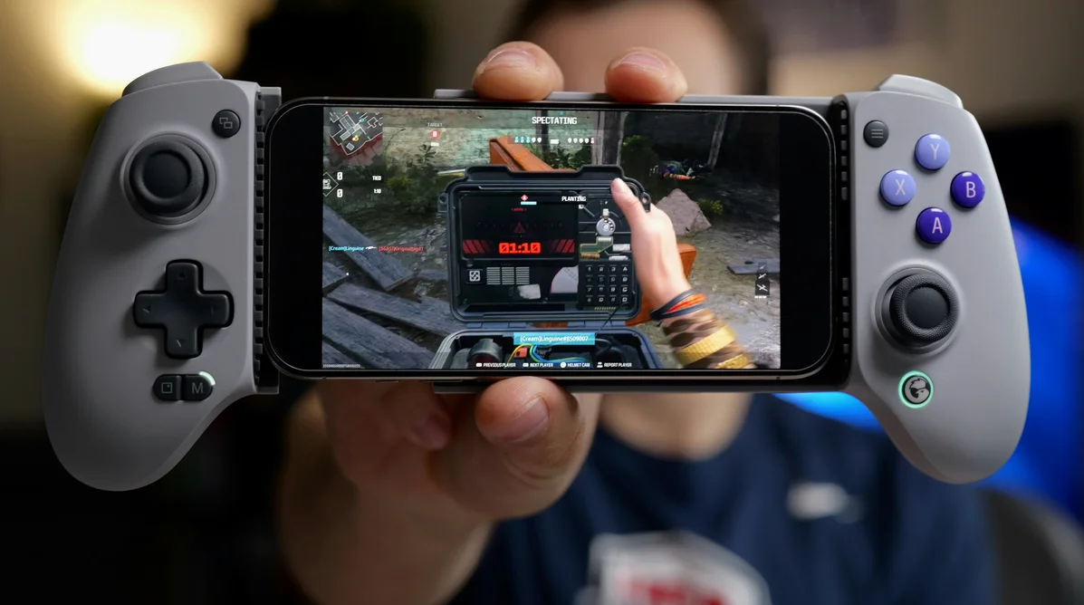 A smartphone displaying the new features of Android 17 with a gaming controller A smartphone displaying the new features of Android 17 with a gaming controller