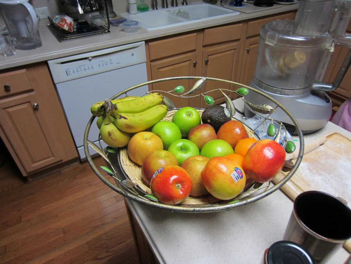Assorted fresh fruits for making homemade jams on a wooden table Assorted fresh fruits for making homemade jams on a wooden table