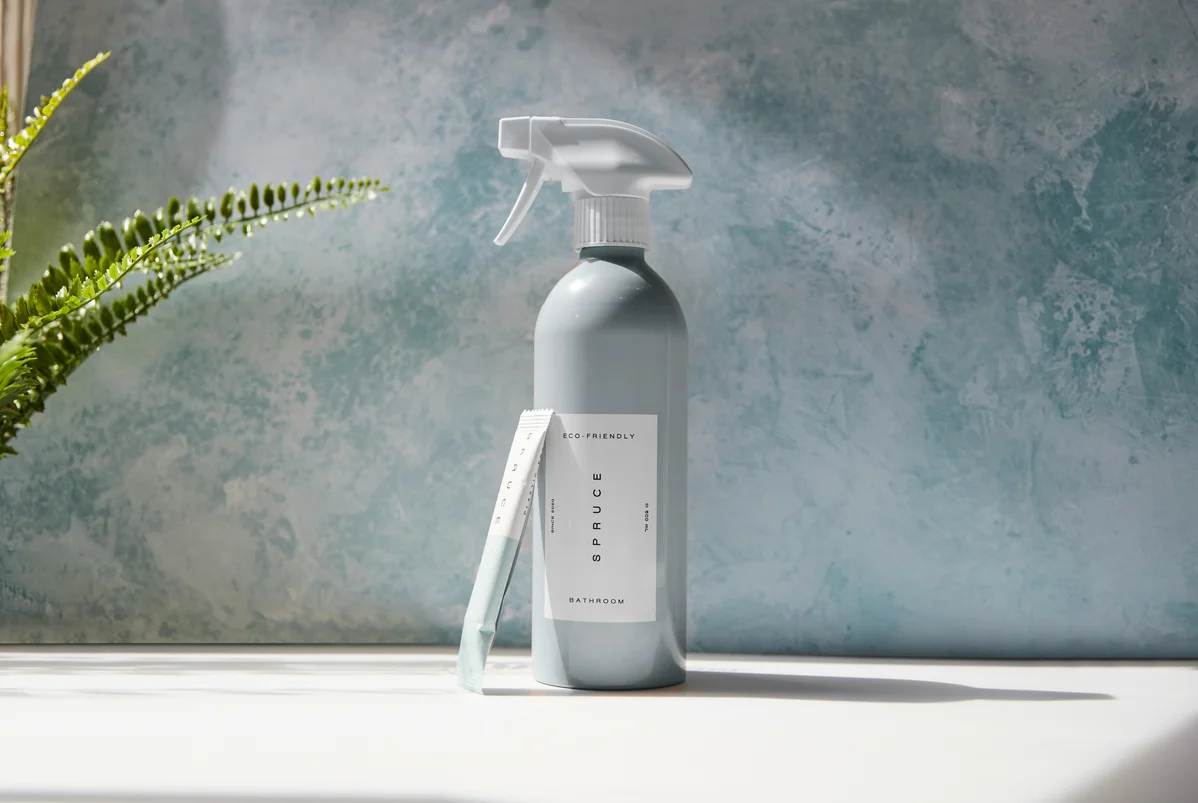 Eco-friendly cleaning products displayed on a kitchen counter Eco-friendly cleaning products displayed on a kitchen counter
