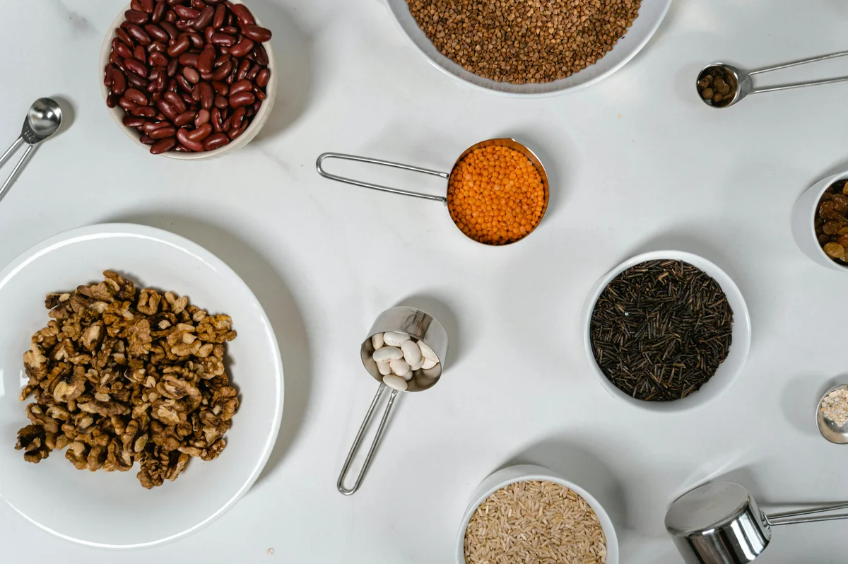 Variety of nuts and seeds in bowls for healthy snacking Variety of nuts and seeds in bowls for healthy snacking