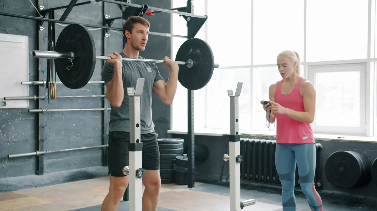 Weight lifting equipment in a gym for strength training Weight lifting equipment in a gym for strength training