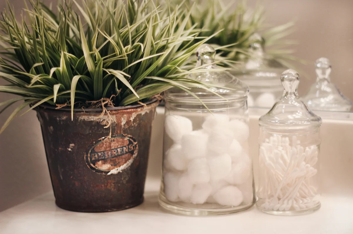 Repurposed Mason jars used for bathroom decor Repurposed Mason jars used for bathroom decor