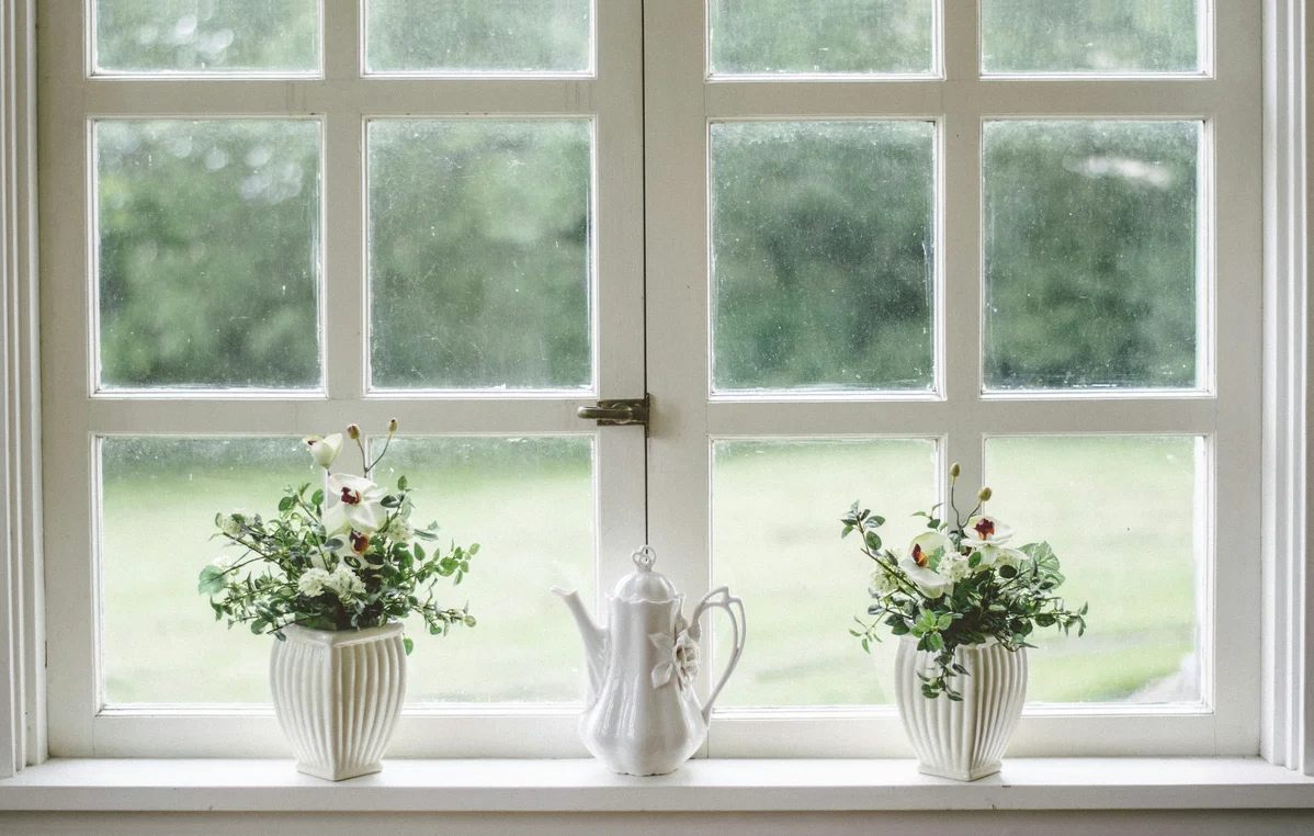 Open windows allowing fresh air circulation in a home Open windows allowing fresh air circulation in a home