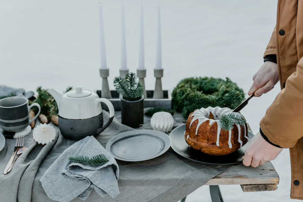 A rustic arrangement featuring a painted Bundt pan as a centerpiece A rustic arrangement featuring a painted Bundt pan as a centerpiece